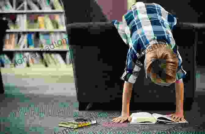 A Child Engrossed In Reading The Book World Flags: A Of Colors And Counting (Our World 3)