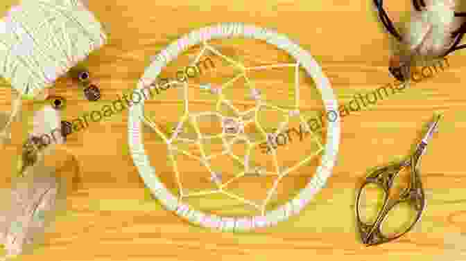 A Person Creating A Dreamcatcher Web DREAMCATCHER: STEP BY STEP INSTRUCTIONS FOR BEGINNERS