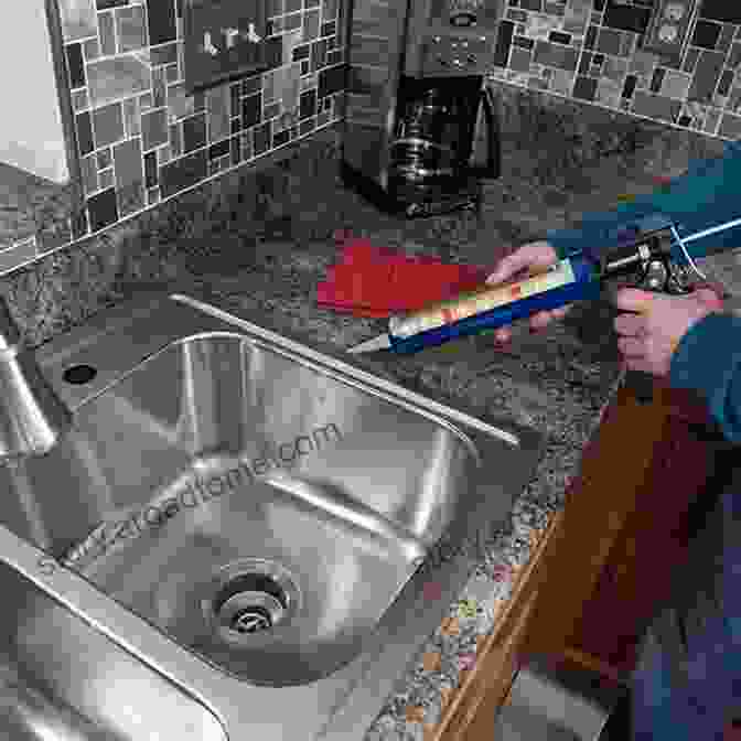 A Person Installing A Kitchen Sink American Owner Builder: The Step By Step Guide To Owner Building