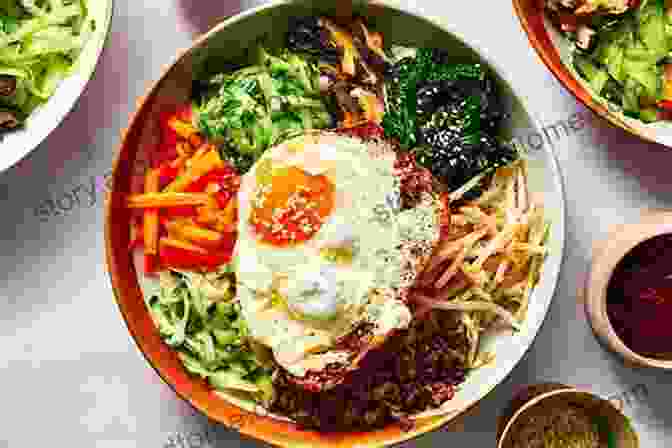 A Vibrant Photograph Of A Bibimbap Dish, Showcasing Its Colorful Ingredients And Enticing Presentation. Korean Takeout Cookbook: Favorite Korean Takeout Recipes To Make At Home