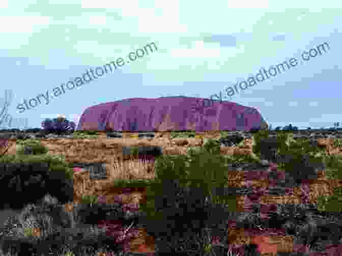 Majestic Uluru, A Sandstone Monolith Nestled Amidst The Vast Australian Outback Why People Should Visit Uluru (Rigby PM Generations)